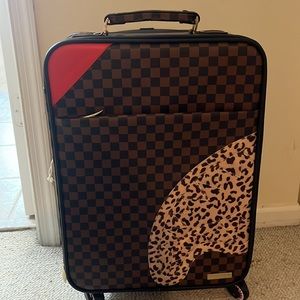 Spray ground suitcase